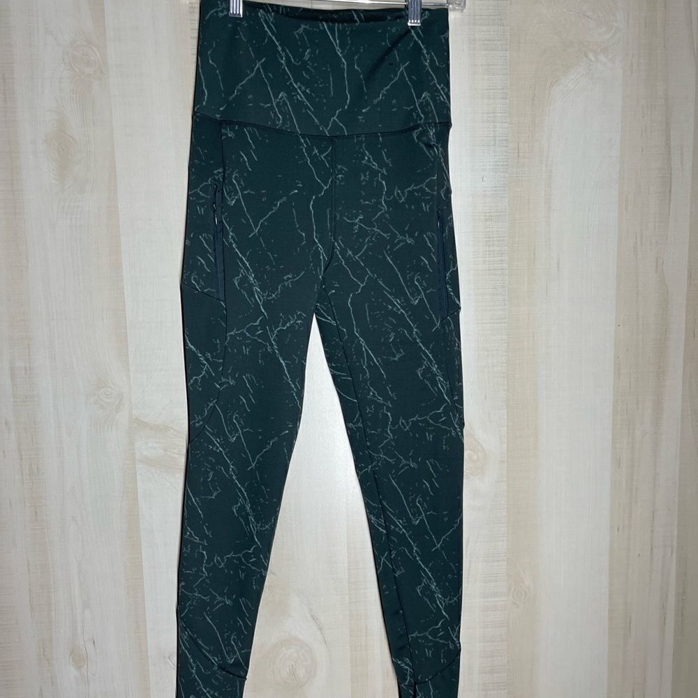 Kay‎ Unger green leggings with pockets, size medium